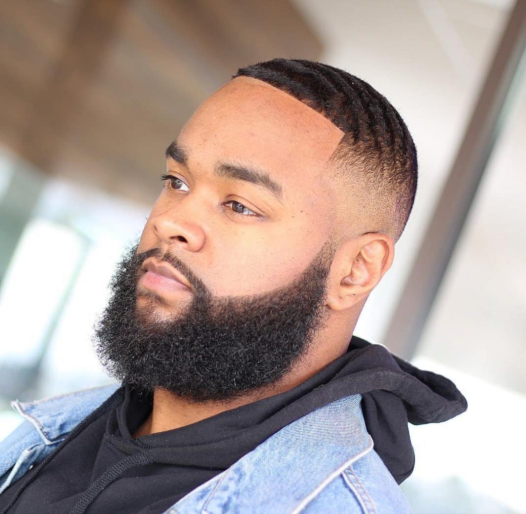 A Bold Blend of Waves, Skin Fade, and Full Beard