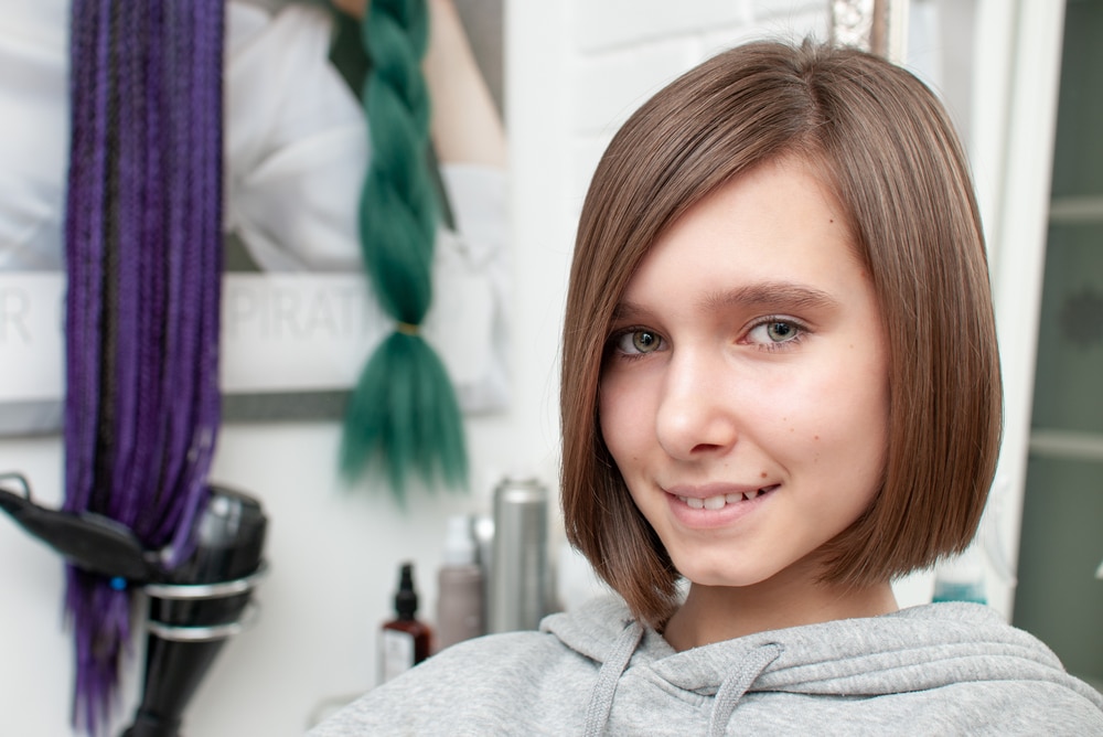 Haircut,On,A,Teenager,Girl,In,A,Beauty,Salon,Close up