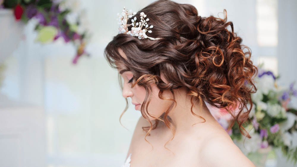 Portrait of a beautiful girl in a wedding dress. Bride in luxurious dress