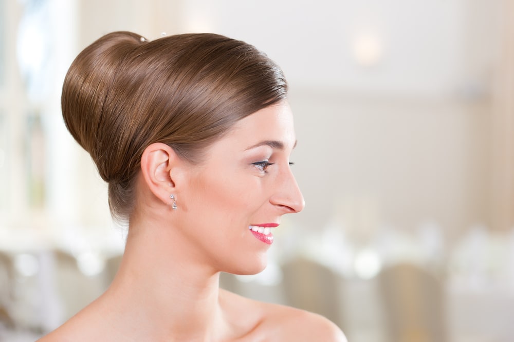 Smiling,Bride,With,Swept back,Hair,Before,The,Wedding