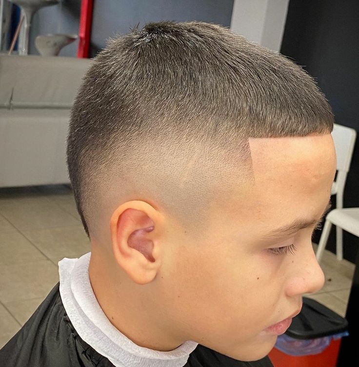 a boy head side view image showing Fade Haircut