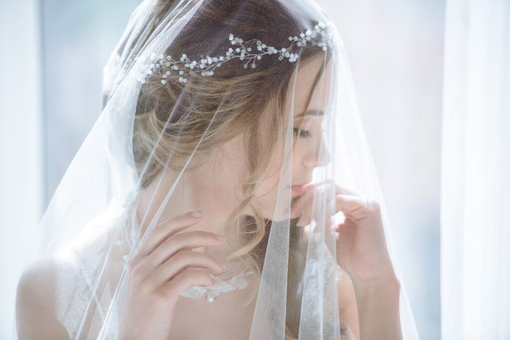 a bride wearing a net veil