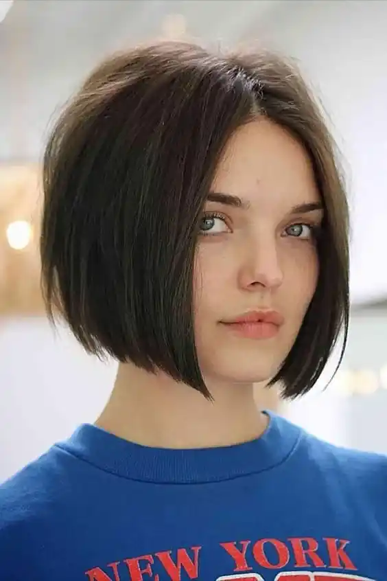 a girl with Straight Hair Chin Length Bob cut