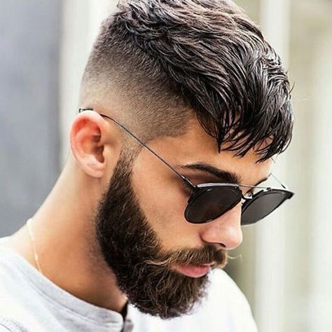 a man wearing glasses on face with Textured Crop with High Fade hairstyle