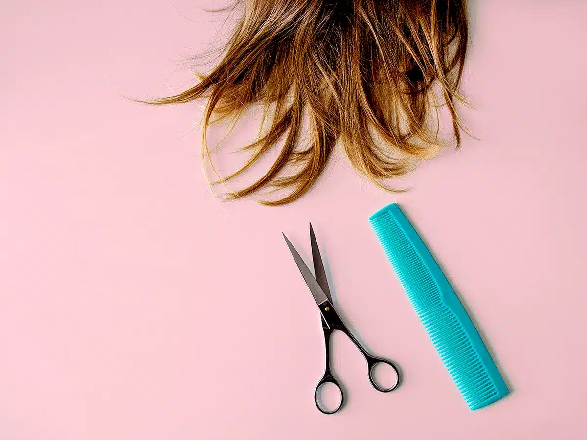 a scissor comb and hair