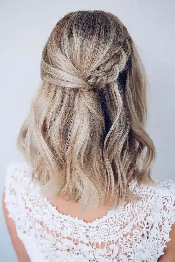 braided half up medium length hairstyle