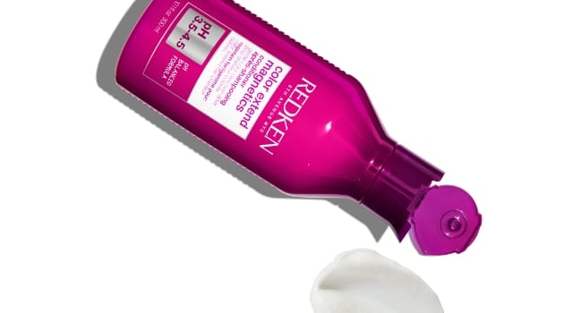 inverted bottle of Redken Color Extend Magnetics Shampoo